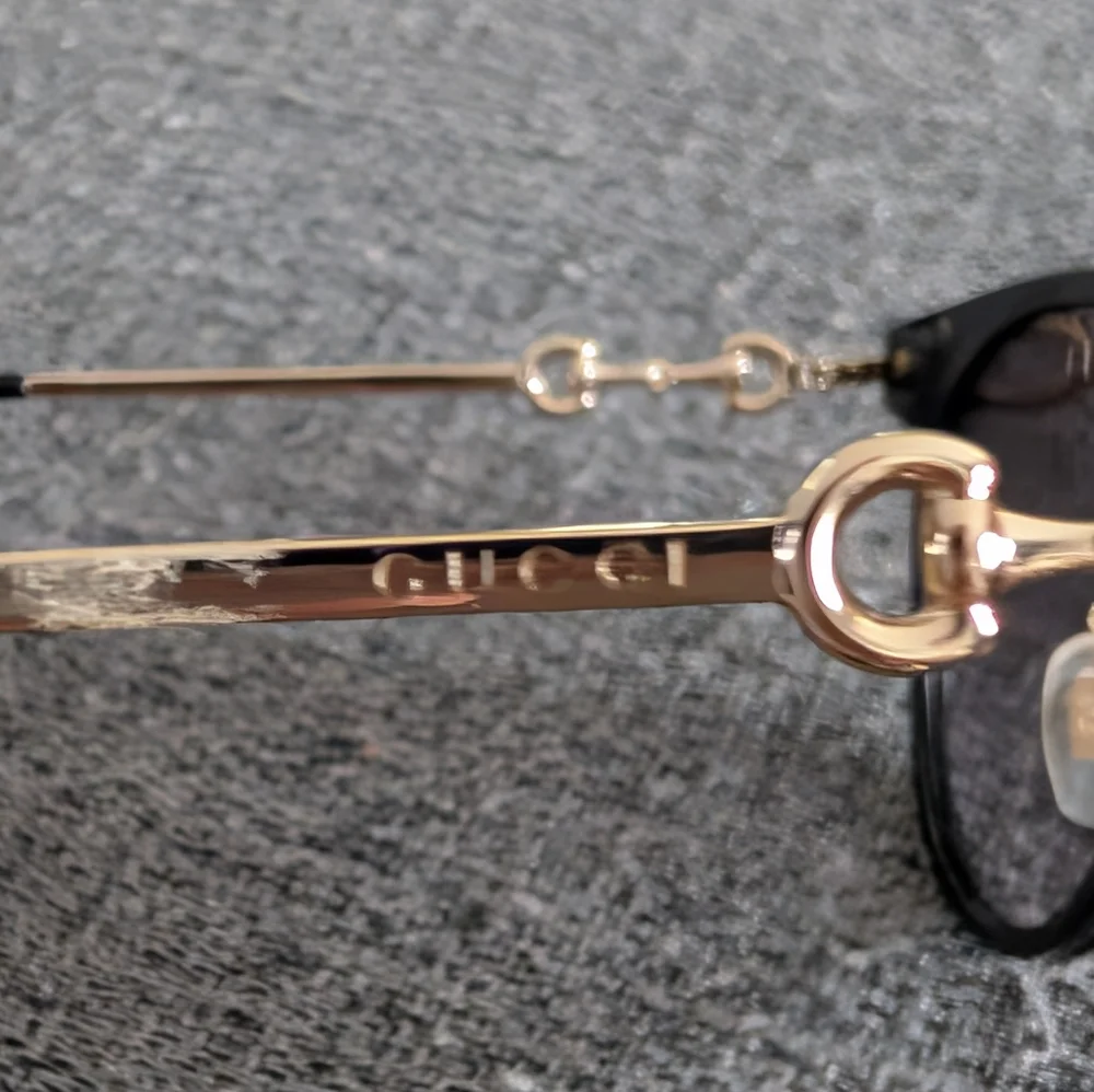 Gucci Women's Sunglasses in Black and Gold